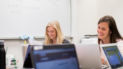 students researching online in class