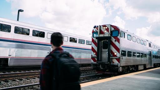 student at train station